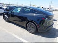 2026 Tesla Model Y — photo 3 of 18 | VIN 7SAYGDEE4TF543614