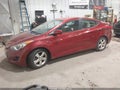 2013 Hyundai Elantra — photo 2 of 12 | VIN 5NPDH4AE1DH377702