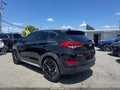 2018 Hyundai Tucson — photo 3 of 10 | VIN KM8J3CA44JU698147