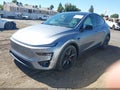 2026 Tesla Model Y — photo 2 of 21 | VIN 7SAYGDET3TA672455