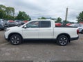 2018 Honda Ridgeline — photo 14 of 16 | VIN 5FPYK3F53JB009898
