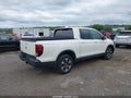 2018 Honda Ridgeline — photo 4 of 16 | VIN 5FPYK3F53JB009898