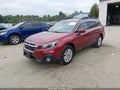2019 Subaru Outback — photo 2 of 16 | VIN 4S4BSAFC5K3327646
