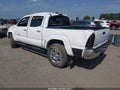 2013 Toyota Tacoma — photo 3 of 15 | VIN 5TFLU4EN6DX082004