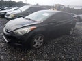 2013 Hyundai Elantra — photo 2 of 17 | VIN 5NPDH4AE4DH353457