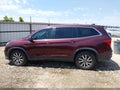 2019 Honda Pilot — photo 13 of 15 | VIN 5FNYF5H39KB045648