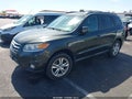2012 Hyundai Santa Fe — photo 2 of 12 | VIN 5XYZHDAG1CG131858