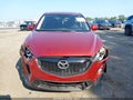 2013 Mazda CX-5 — photo 13 of 17 | VIN JM3KE2DE4D0151495