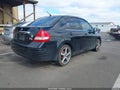 2008 Nissan Versa — photo 4 of 14 | VIN 3N1BC11E98L402813