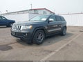 2011 Jeep Grand Cherokee — photo 2 of 18 | VIN 1J4RR6GG2BC744651