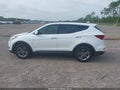 2017 Hyundai Santa Fe — photo 14 of 16 | VIN 5NMZU3LB3HH028073
