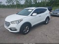 2017 Hyundai Santa Fe — photo 2 of 16 | VIN 5NMZU3LB3HH028073