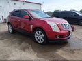 2015 Cadillac SRX — photo 1 of 16 | VIN 3GYFNDE38FS598677
