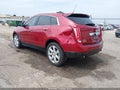 2015 Cadillac SRX — photo 3 of 16 | VIN 3GYFNDE38FS598677