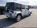 2010 Jeep Wrangler Unlimited — photo 4 of 16 | VIN 1J4HA5H15AL103239