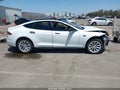 2014 Tesla Model S — photo 12 of 15 | VIN 5YJSA1H17EFP52876