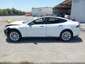 2014 Tesla Model S — photo 13 of 15 | VIN 5YJSA1H17EFP52876