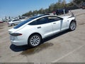 2014 Tesla Model S — photo 4 of 15 | VIN 5YJSA1H17EFP52876