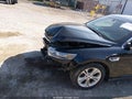 2014 Ford Taurus — photo 15 of 16 | VIN 1FAHP2E87EG108435