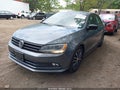 2015 Volkswagen Jetta — photo 2 of 12 | VIN 3VWD17AJ5FM215990