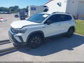 2022 Volkswagen Taos — photo 2 of 15 | VIN 3VVCX7B24NM065939