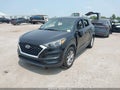 2021 Hyundai Tucson — photo 2 of 17 | VIN KM8J23A47MU338491