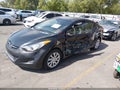 2011 Hyundai Elantra — photo 2 of 17 | VIN 5NPDH4AE1BH013504