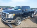 2017 Nissan Titan — photo 2 of 17 | VIN 1N6AA1F33HN503610