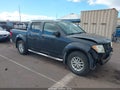 2015 Nissan Frontier — photo 1 of 16 | VIN 1N6AD0ER7FN755963