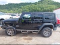 2017 Jeep Wrangler Unlimited — photo 14 of 19 | VIN 1C4BJWDG5HL561028