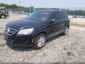 2011 Volkswagen Tiguan — photo 2 of 11 | VIN WVGBV7AX7BW564240