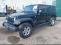 2015 Jeep Wrangler Unlimited — photo 2 of 16 | VIN 1C4BJWDG9FL598676