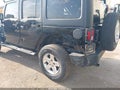 2015 Jeep Wrangler Unlimited — photo 6 of 16 | VIN 1C4BJWDG9FL598676