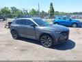 2024 Mazda CX-50 — photo 1 of 17 | VIN 7MMVABEM0RN195172