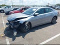 2016 Acura TLX — photo 2 of 16 | VIN 19UUB2F35GA001062