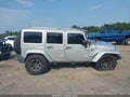 2012 Jeep Wrangler Unlimited — photo 13 of 16 | VIN 1C4HJWEG2CL170470
