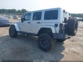 2012 Jeep Wrangler Unlimited — photo 3 of 16 | VIN 1C4HJWEG2CL170470