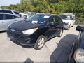 2010 Hyundai Tucson — photo 2 of 11 | VIN KM8JUCAC8AU081936