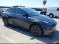 2024 Tesla Model Y — photo 1 of 18 | VIN 7SAYGDEE4RF209625