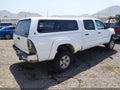 2010 Toyota Tacoma — photo 4 of 17 | VIN 3TMMU4FN2AM022466