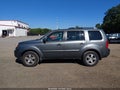 2011 Honda Pilot — photo 14 of 16 | VIN 5FNYF4H57BB043537
