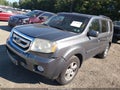 2011 Honda Pilot — photo 2 of 16 | VIN 5FNYF4H57BB043537