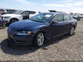 2015 Volkswagen Passat — photo 2 of 19 | VIN 1VWBV7A33FC062329