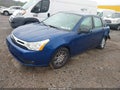 2009 Ford Focus — photo 2 of 12 | VIN 1FAHP35N09W140151