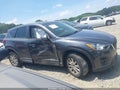 2016 Mazda CX-5 — photo 13 of 16 | VIN JM3KE2CY9G0833708