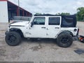 2014 Jeep Wrangler Unlimited — photo 15 of 17 | VIN 1C4HJWDG2EL113514