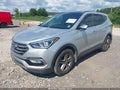 2017 Hyundai Santa Fe — photo 2 of 16 | VIN 5XYZU3LB5HG424855