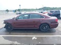 2013 Volkswagen Passat — photo 14 of 16 | VIN 1VWBP7A34DC098036