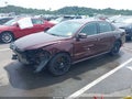 2013 Volkswagen Passat — photo 2 of 16 | VIN 1VWBP7A34DC098036