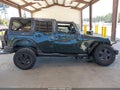2011 Jeep Wrangler Unlimited — photo 14 of 17 | VIN 1J4BA5H19BL518474